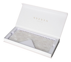 White Jade Eye Mask 634885 in open luxury packaging, showcasing its pure elegance for luminous, youthful eyes by Sylvia Crystals.
