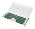 Green Awenturine Eye Mask 634892 displayed in an open white box, showcasing its cooling and revitalizing properties for skincare.