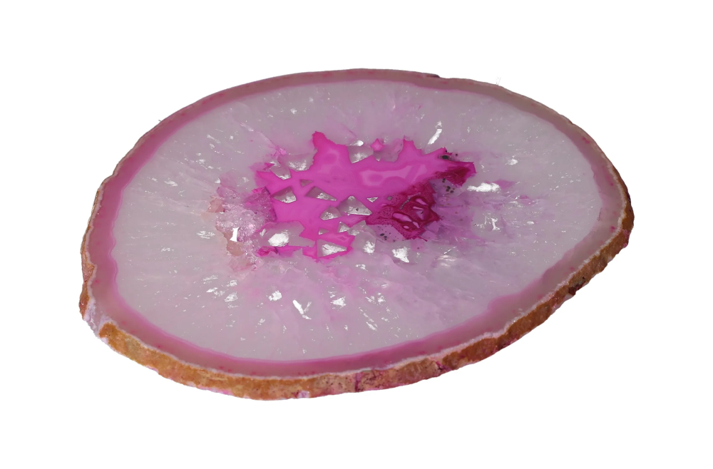 Polished Agate Slice With Quartz 635141 showcasing vibrant pink hues against a white background.