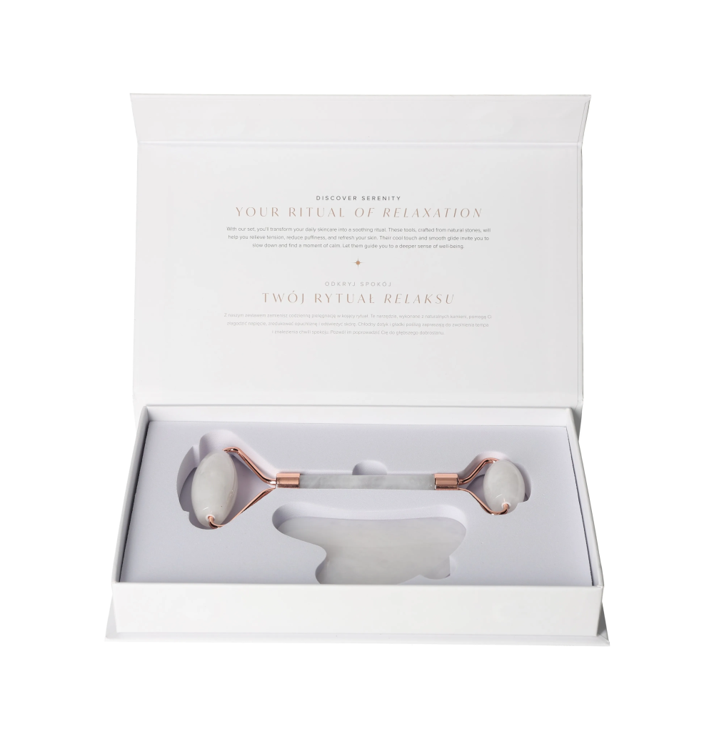 White Jade Roller And Gua Sha Set 635349 in an open luxury packaging box with dual-ended roller and gua sha tool for skincare rituals.