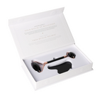 Obsidian Roller And Gua Sha Set 635363 in elegant gift box showcasing volcanic black stone tools for skin renewal and beauty rituals.