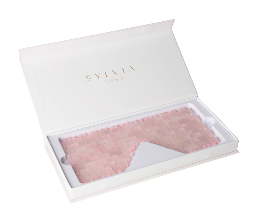 Rose Quartz Eye Mask 635370 in elegant packaging promoting relaxation and spa-like care for eyes.