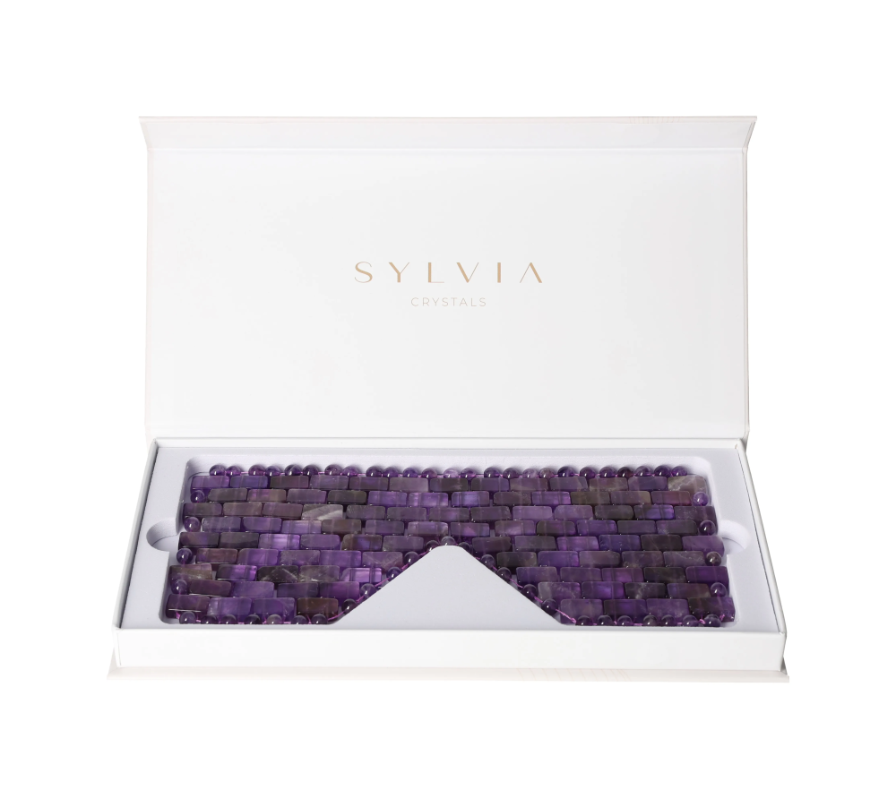 Amethyst Eye Mask 635400 in open box, showcasing its calming purple crystals for soothing and rejuvenating eye care.