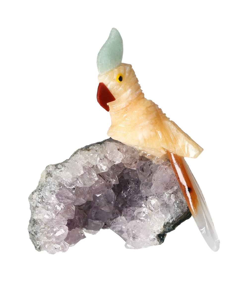 Yellow Calcite Parrot On Quartz 636568 perched on colorful quartz, highlighting its unique spiritual properties and chakra associations.