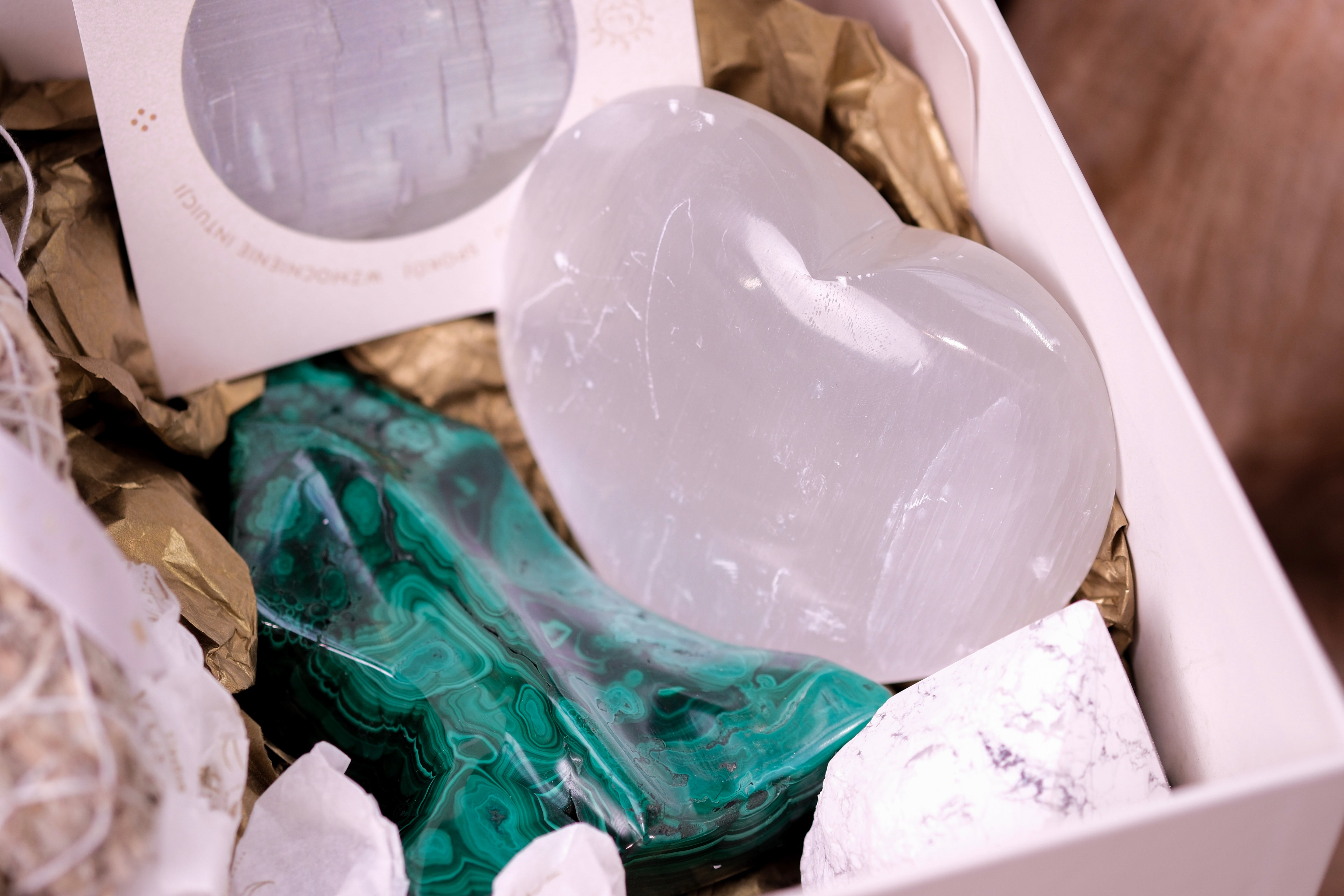 Deluxe Christmas Box with selenite heart, malachite, Raulite, and white sage by Sylvia Crystals for growth and renewal.