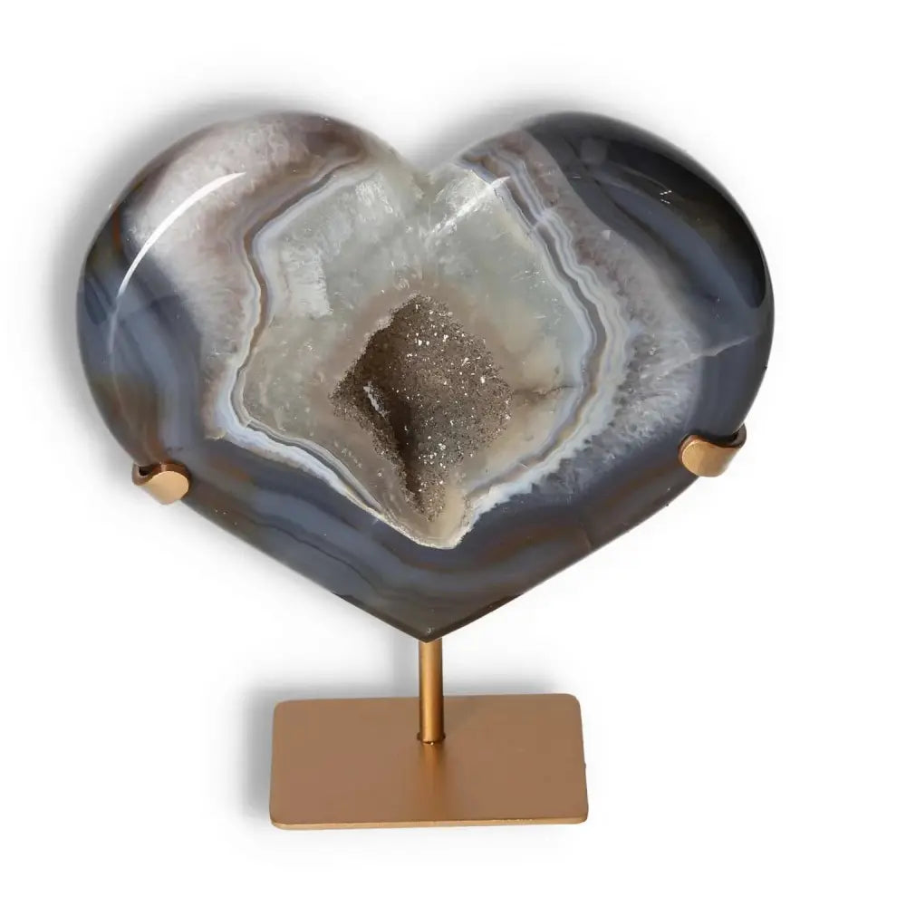 Agate Heart with stand showcasing unique patterns, natural veining, and crystalline formations, perfect for elegant decor.