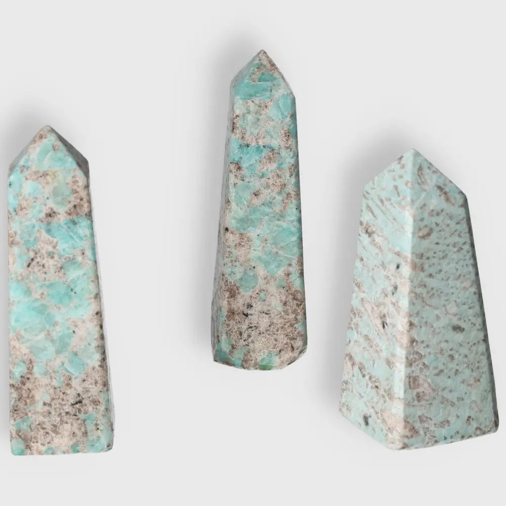 XL Amazonite tower with calming turquoise shades, promoting courage and truth, ideal for emotional balance and clear communication.