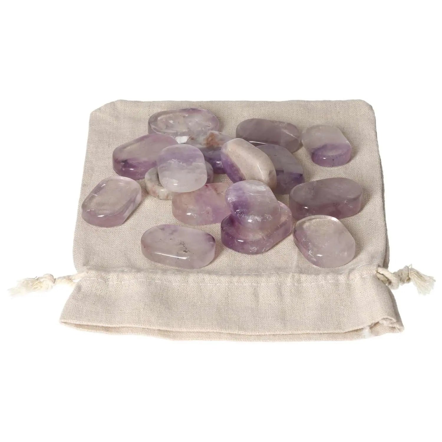 Amethyst thumb massagers laid on a soft cloth, offering antistress benefits and concentration enhancement.