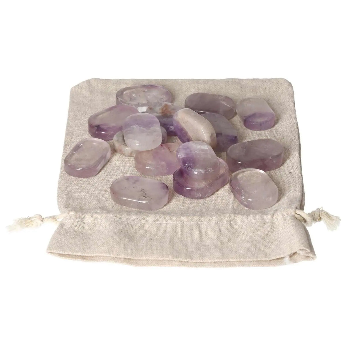 Amethyst thumb massagers laid on a soft cloth, offering antistress benefits and concentration enhancement.