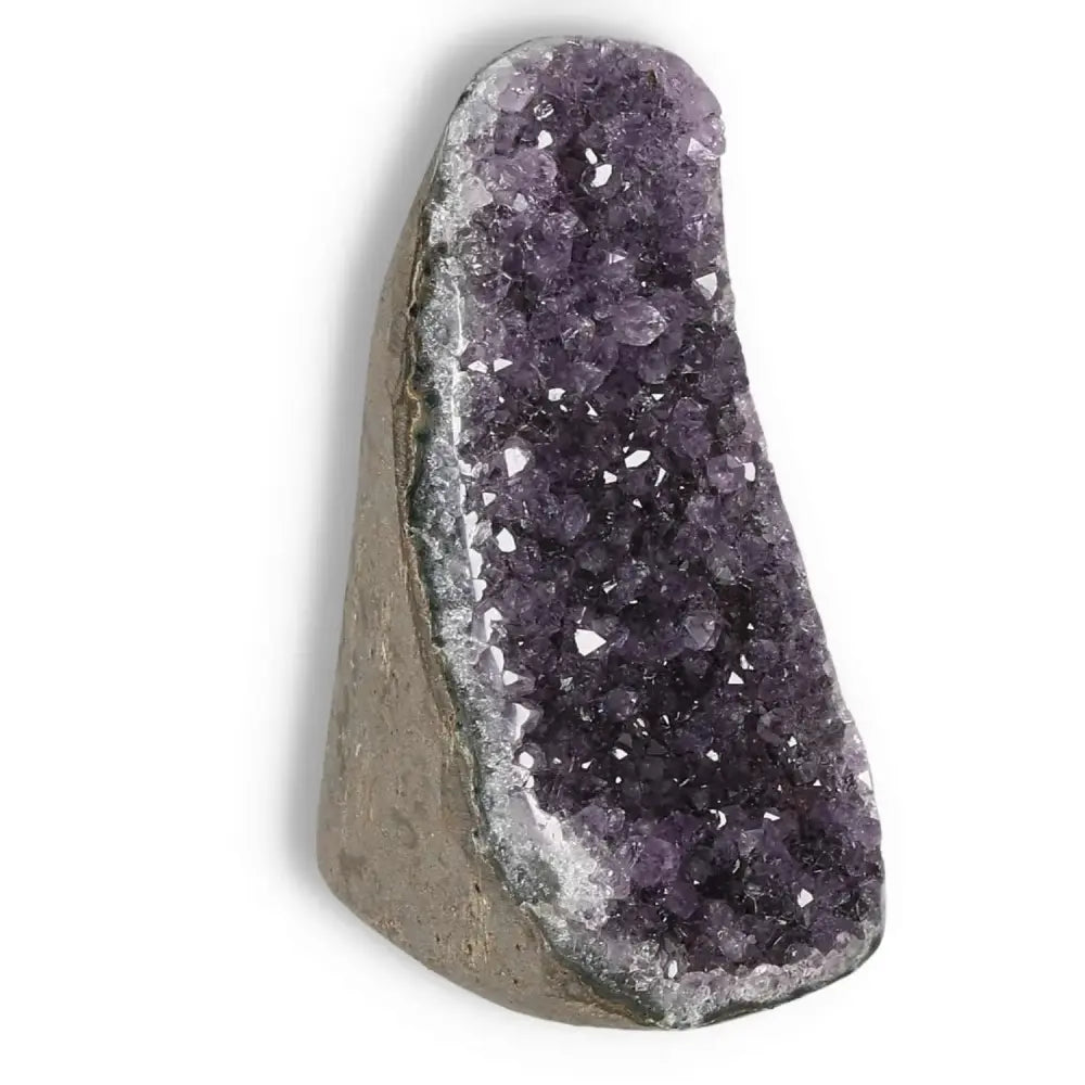 Amethyst Cut Base Geode from Sylvia Crystals, enhancing tranquility and stress relief with its natural beauty and serene aura.