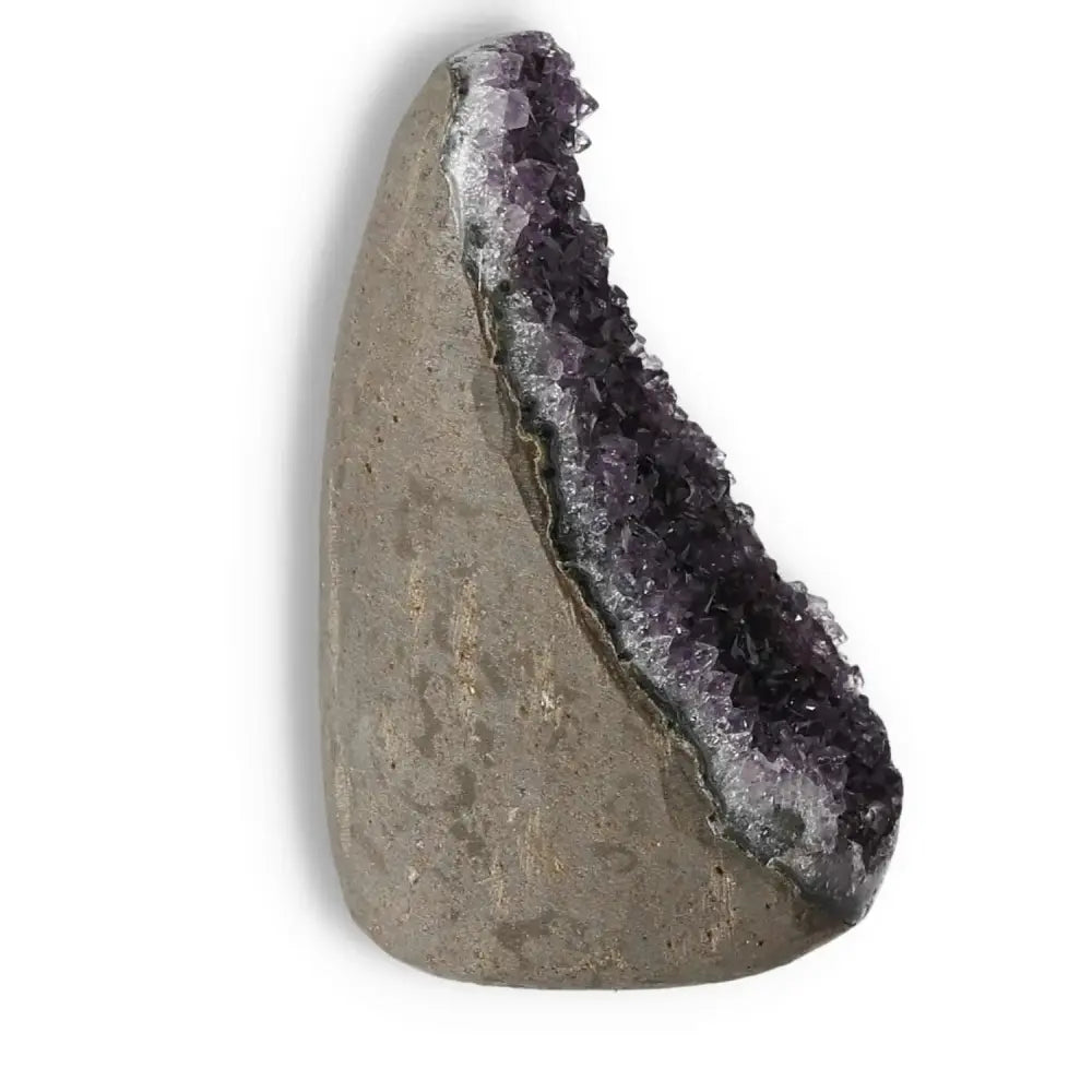 Premium Amethyst Cut Base Geode from Sylvia Crystals, showcasing its captivating purple crystals on a rugged stone base.