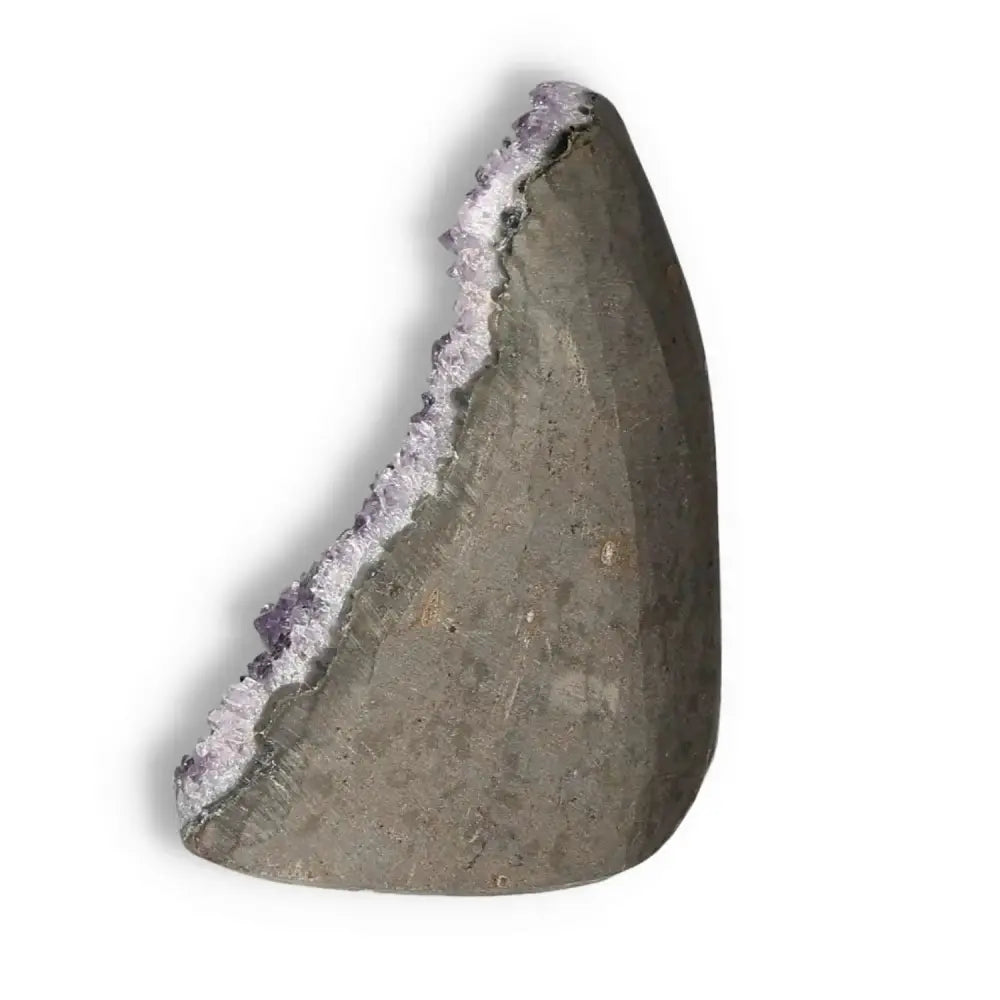 Amethyst Cut Base Geode from Sylvia Crystals, showcasing natural allure and stress-relief properties, ideal for home decor.
