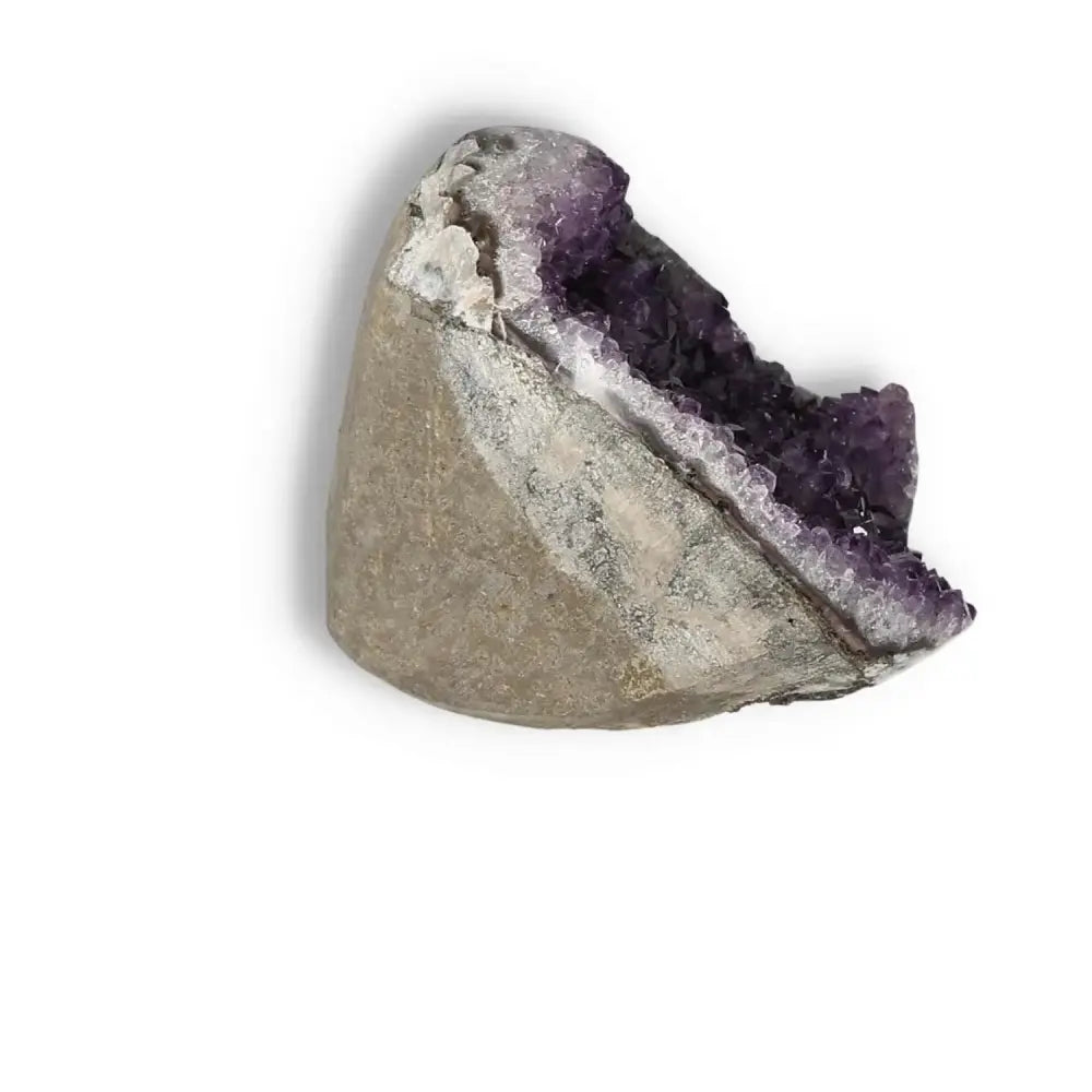 Amethyst Cut Base Geode featuring rich purple crystals from Sylvia Crystals, ideal for stress reduction and energy enhancement.