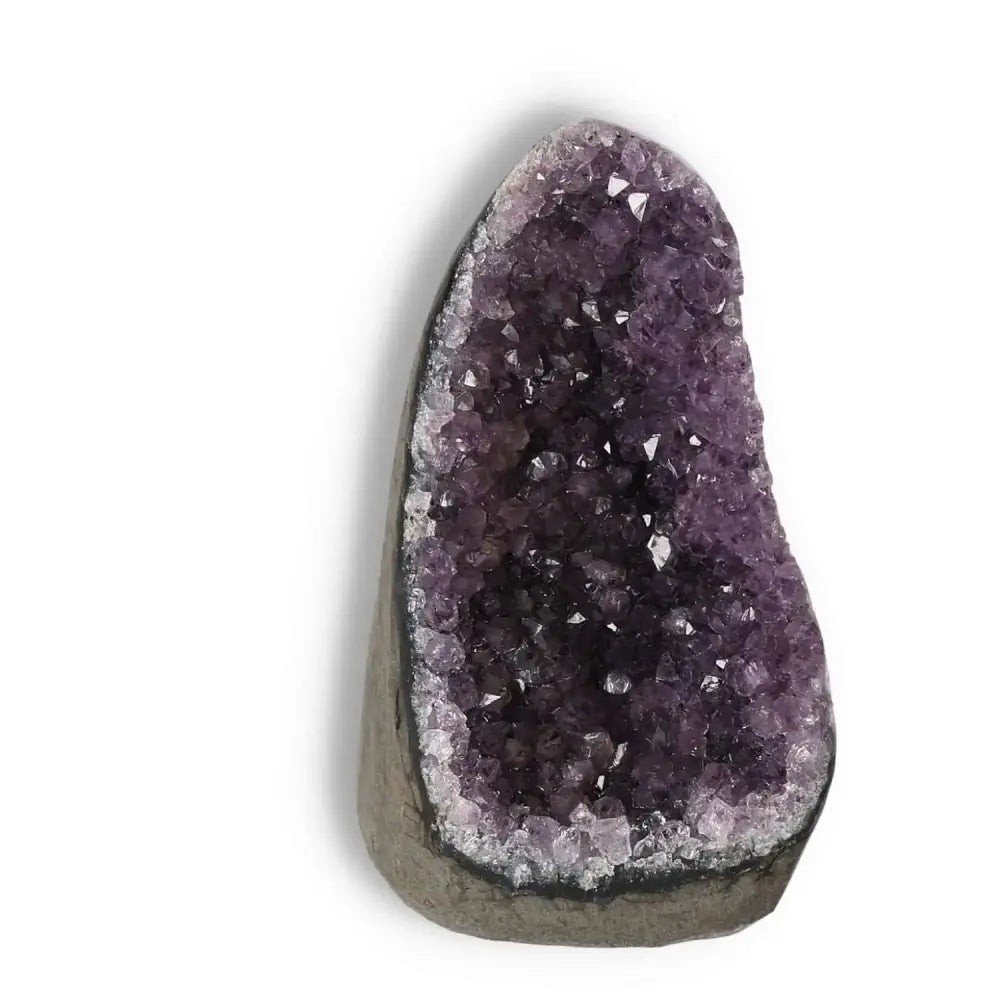 Premium Amethyst Cut Base Geode by Sylvia Crystals, showcasing exquisite purple hues and promoting stress relief and energy balance.