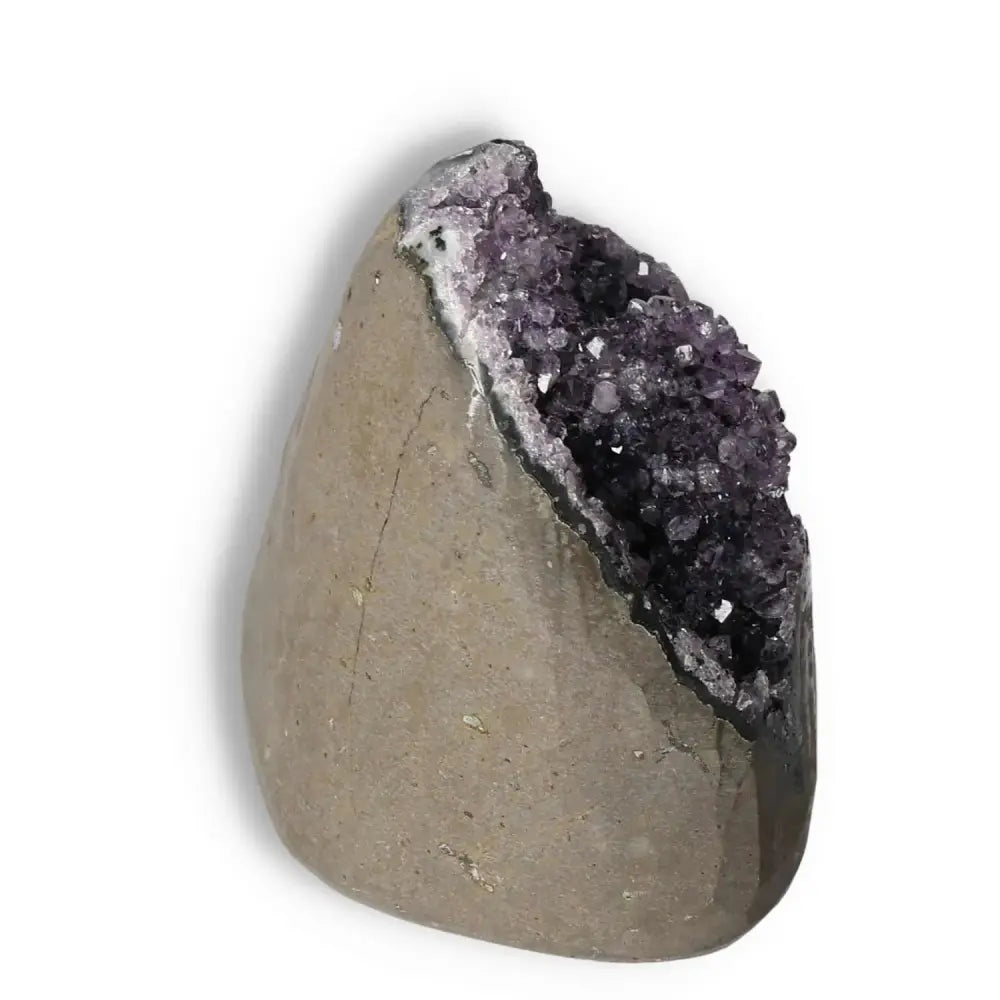 Amethyst Cut Base Geode by Sylvia Crystals, luxury purple gemstone for stress relief and energy boost in modern design.