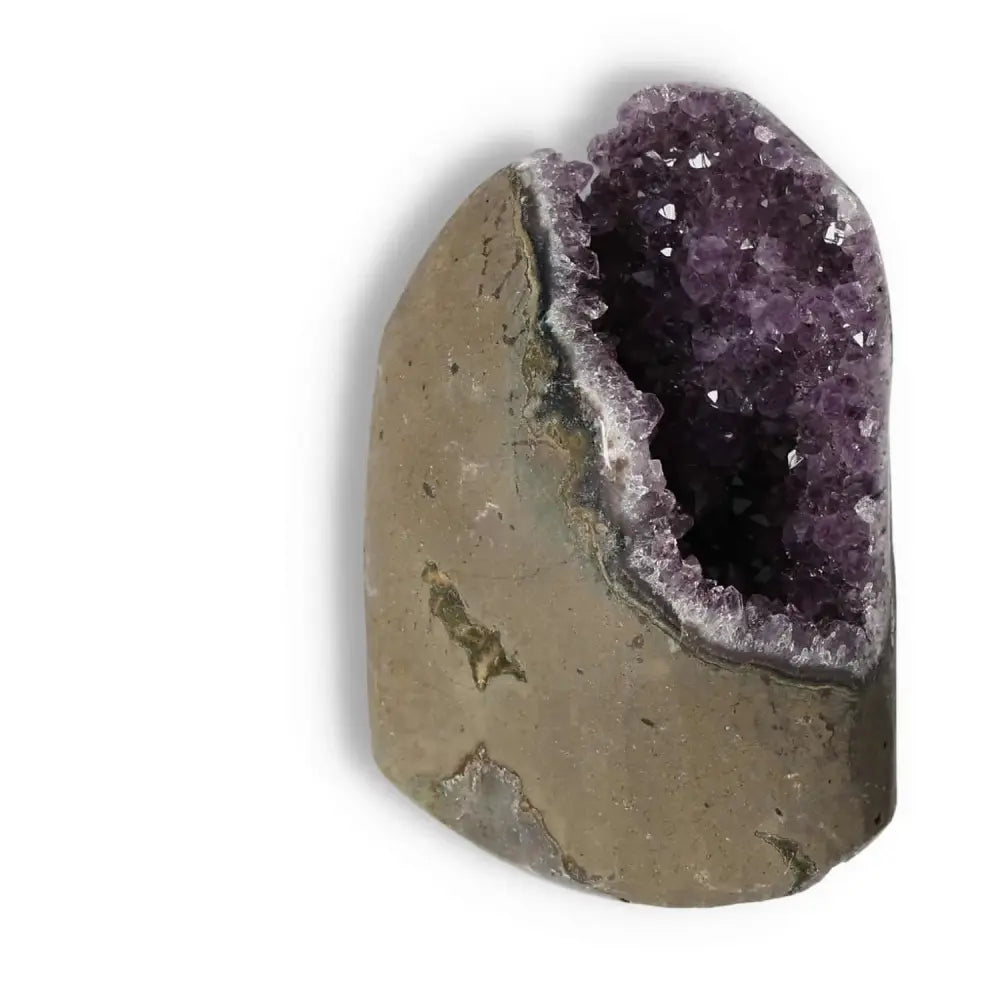 Natural Amethyst cut base geode with deep purple crystals by Sylvia Crystals, ideal for tranquility and elegance in home decor.