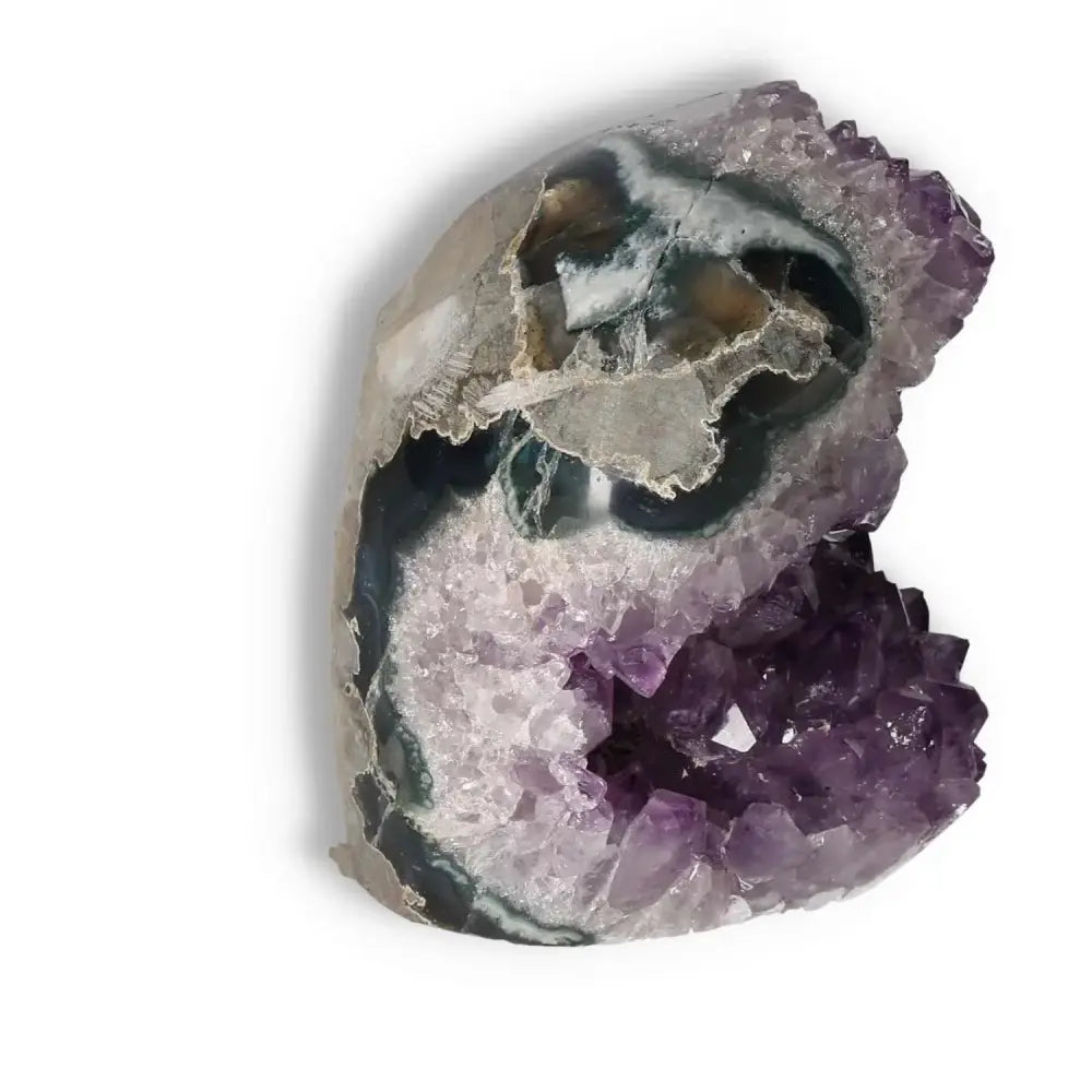 Amethyst cut base geode with deep purple hues, enhancing emotional stability and concentration, from Sylvia Crystals.
