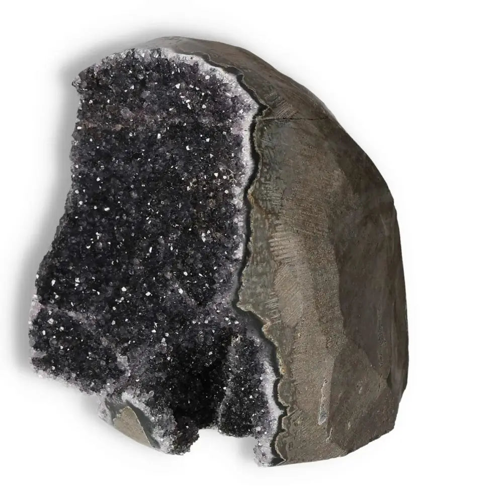 Amethyst Cut Base Geode by Sylvia Crystals, dark purple crystals sparkling inside rough exterior, enhancing decor and emotional balance.