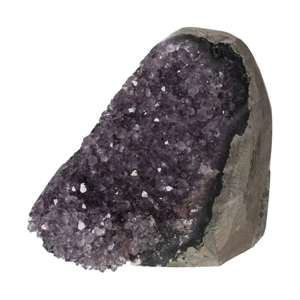Amethyst Cut Base Geode from Sylvia Crystals, offering stress reduction, energy boost, and concentration enhancement in a luxury design.