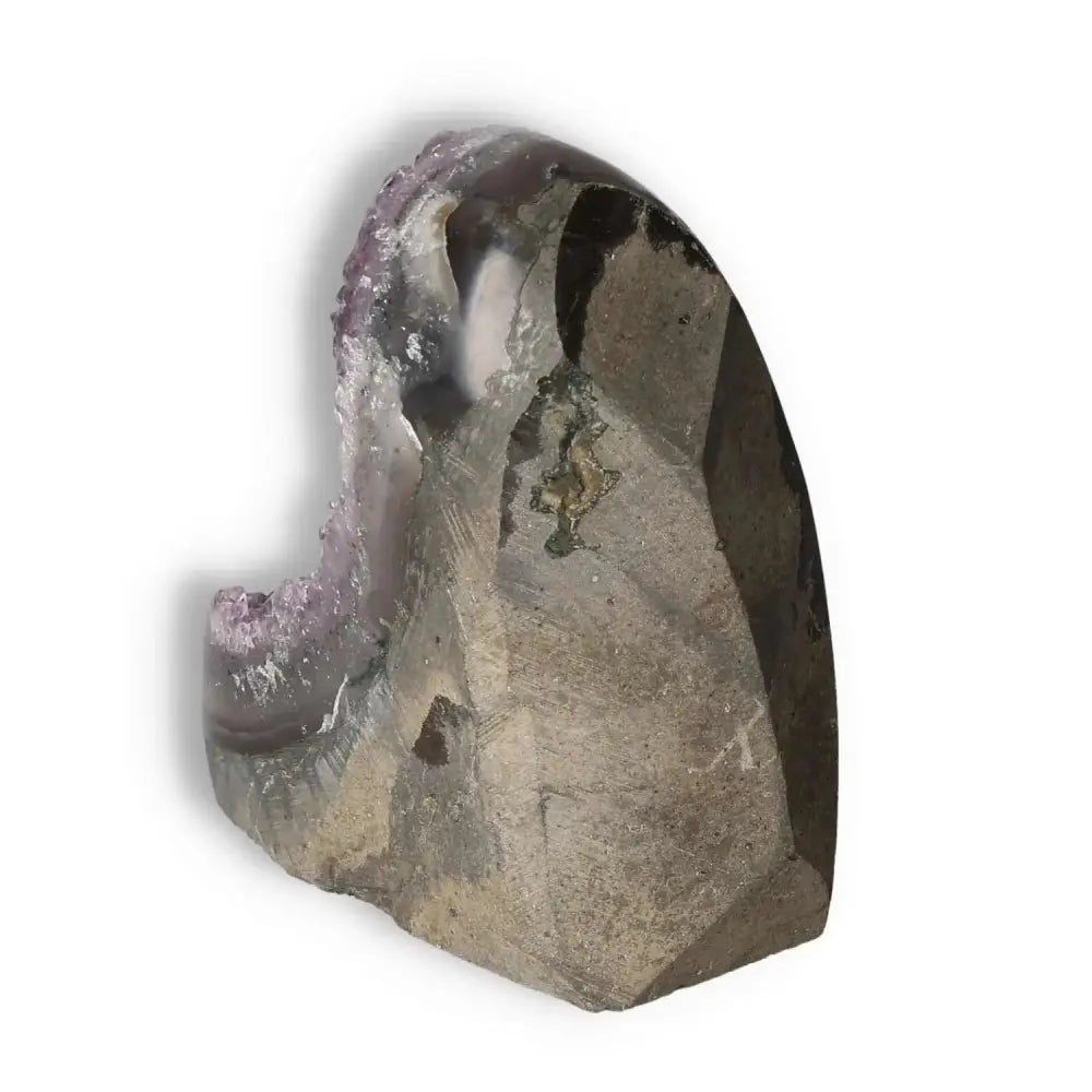 Amethyst Cut Base Geode featuring deep purple hues, from Sylvia Crystals, merging spirituality with contemporary design.