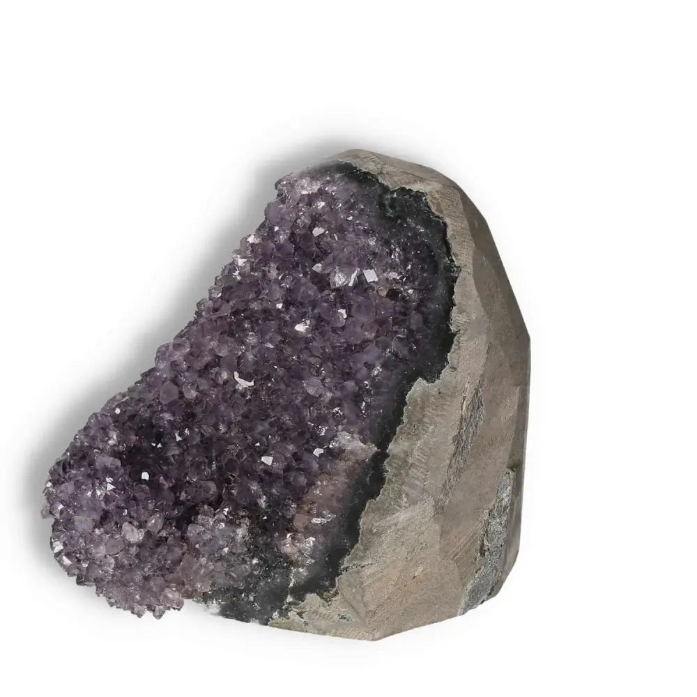 Amethyst cut base geode with sparkling crystals from Sylvia Crystals, enhances focus and reduces stress, premium crystal decor.