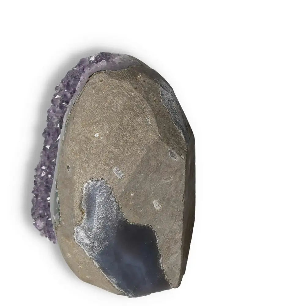 Elegant Amethyst Cut Base Geode by Sylvia Crystals, showcasing luxurious natural beauty and energy in a contemporary design.