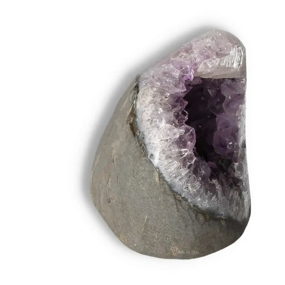 Amethyst Cut Base Geode with vibrant purple hues, offering luxury, spiritual depth, and emotional stability, from Sylvia Crystals.