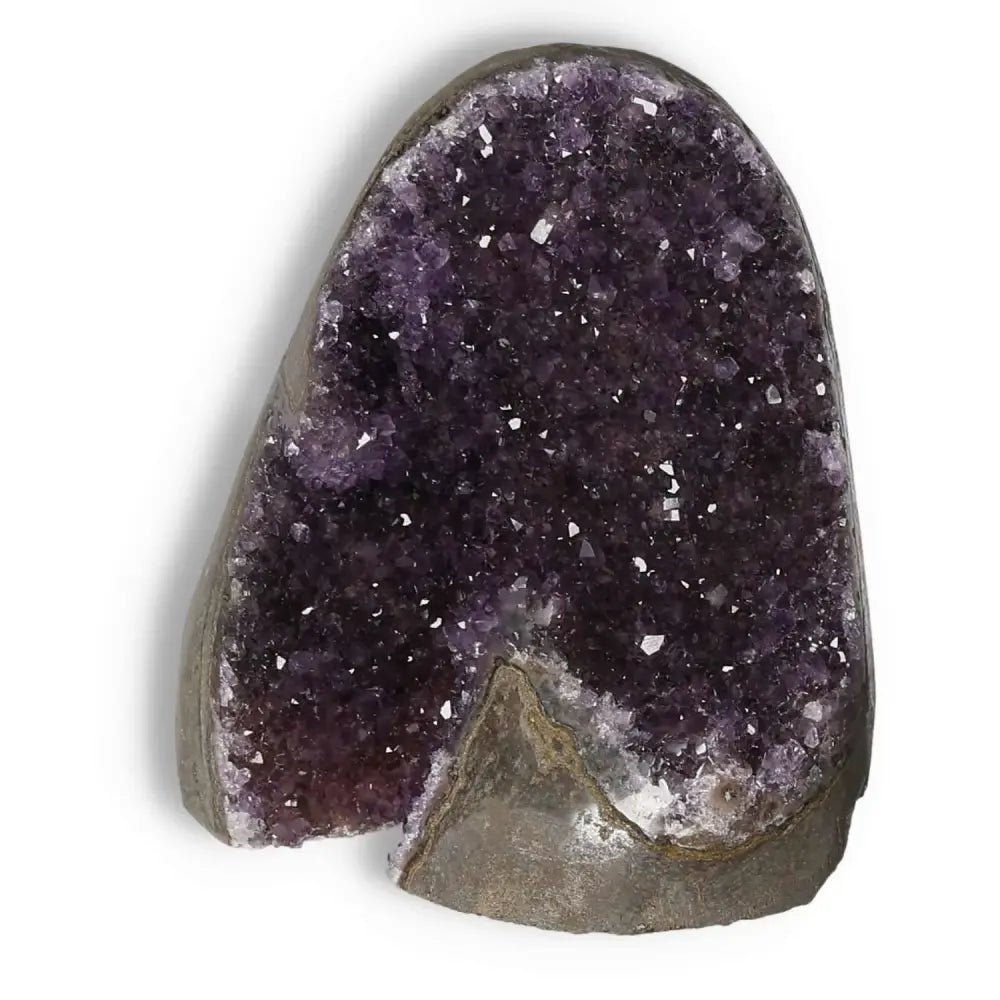 Amethyst Cut Base Geode from Sylvia Crystals, featuring a shimmering purple hue and rugged texture; ideal for decor and enhancing well-being.