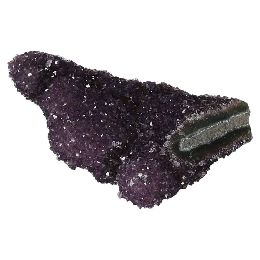 Amethyst Druze from Sylvia Crystals, known for reducing stress and enhancing concentration, with a stunning purple crystal formation.