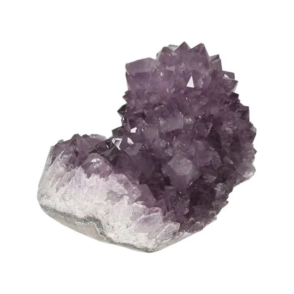 Amethyst Druze crystal cluster from Sylvia Crystals, featuring natural calming hues for stress relief and emotional balance.