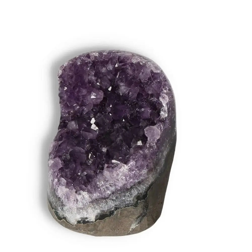Amethyst cut base geode with deep purple crystals for stress relief and emotional balance from Sylvia Crystals.