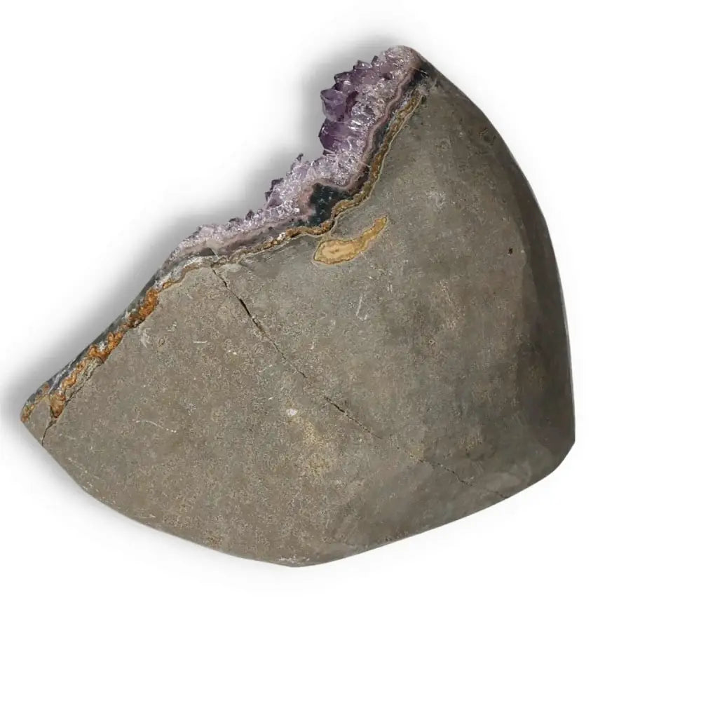 Amethyst cut base geode with violet crystals, offering stress relief and decoration, featured by Sylvia Crystals.