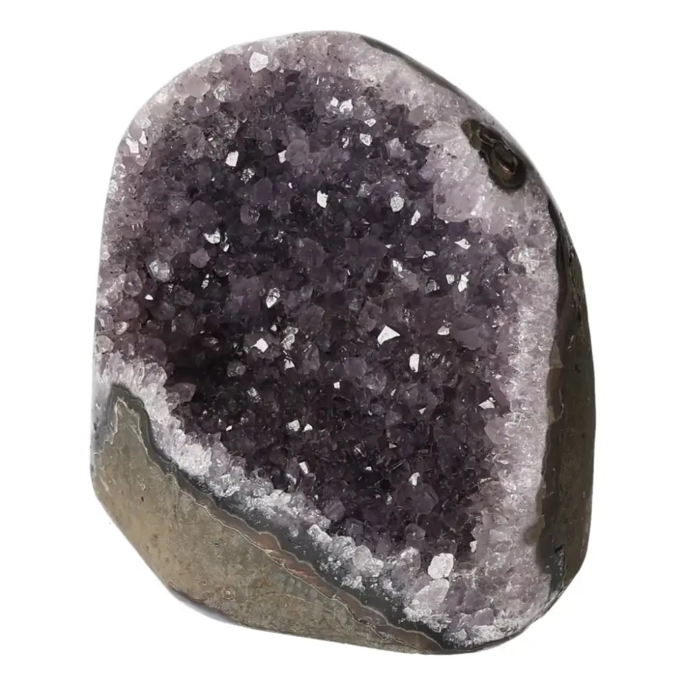 Amethyst cut base geode showcasing natural elegance and spiritual energy from Sylvia Crystals. Premium quality and authenticity.