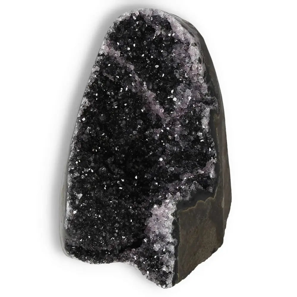 Amethyst cut base geode from Sylvia Crystals, showcasing dark crystals for serenity and clarity, perfect for home or office decor.
