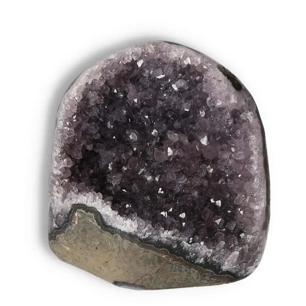 Amethyst cut base geode from Sylvia Crystals, showcasing natural elegance and spiritual energy with premium quality.