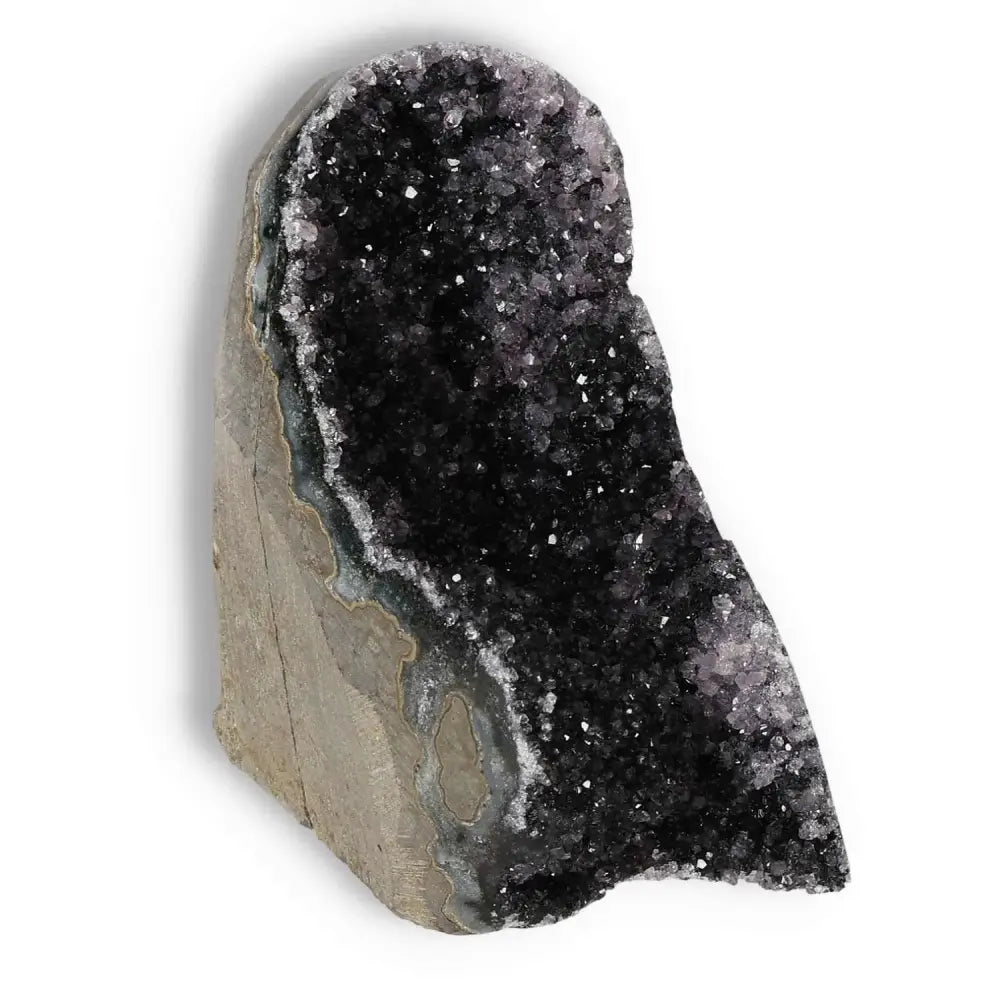 Stunning Amethyst cut base geode showcasing shimmering crystals from Sylvia Crystals, exuding tranquil energy and elegance.