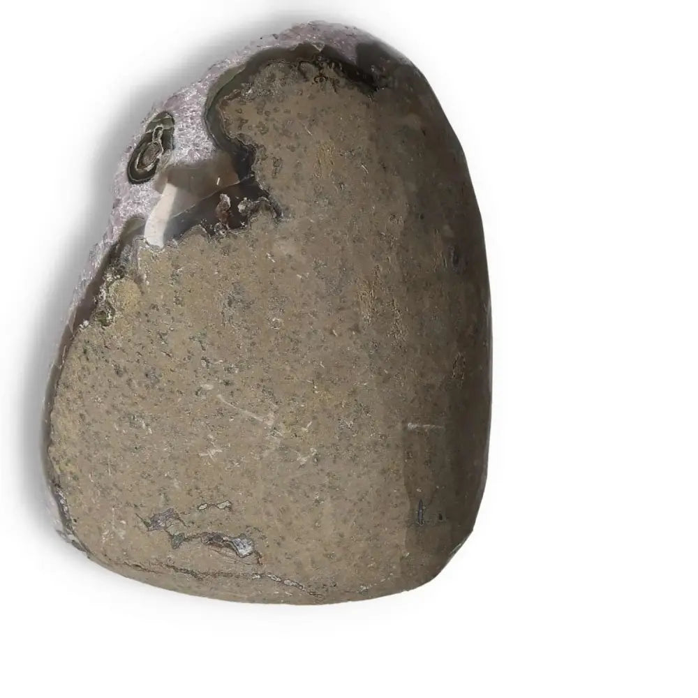 Amethyst cut base geode from Sylvia Crystals, showcasing natural beauty and spiritual energy.