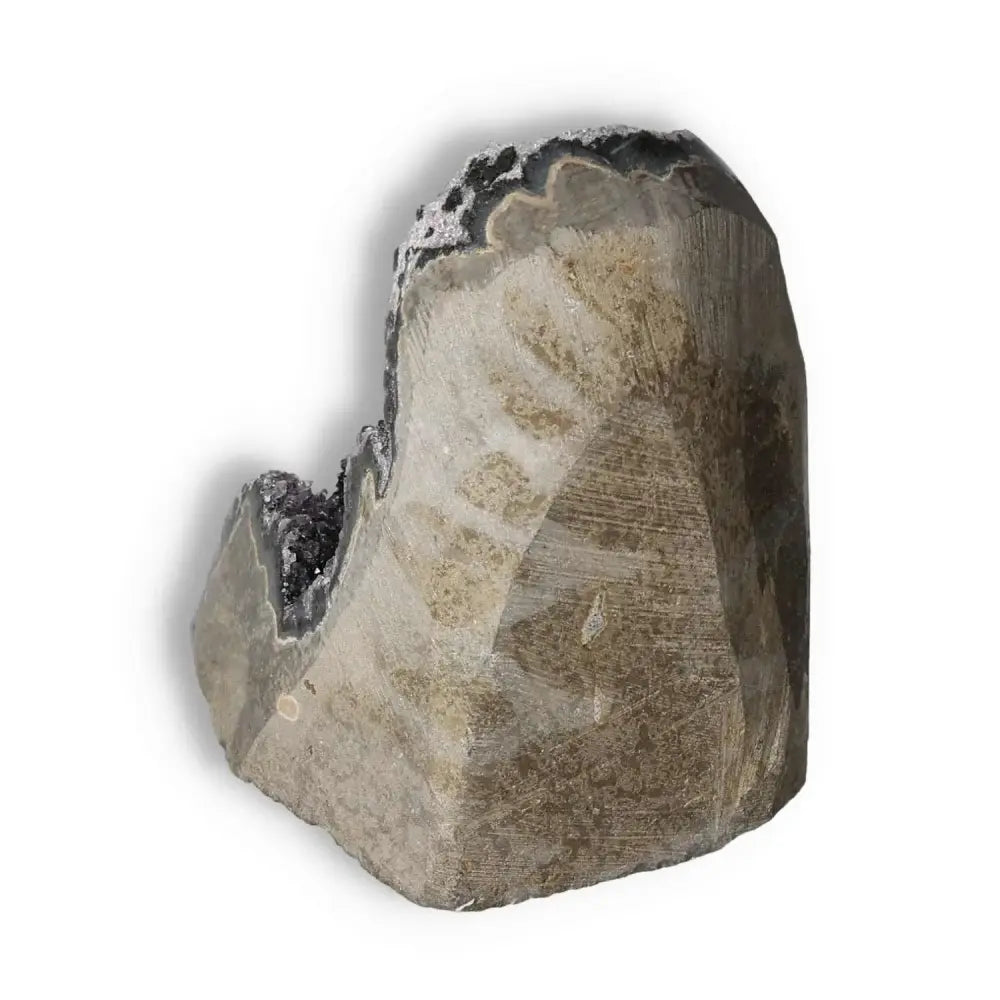 Amethyst cut base geode from Sylvia Crystals, showcasing its natural beauty and serene energy, ideal for stress relief and mental clarity.