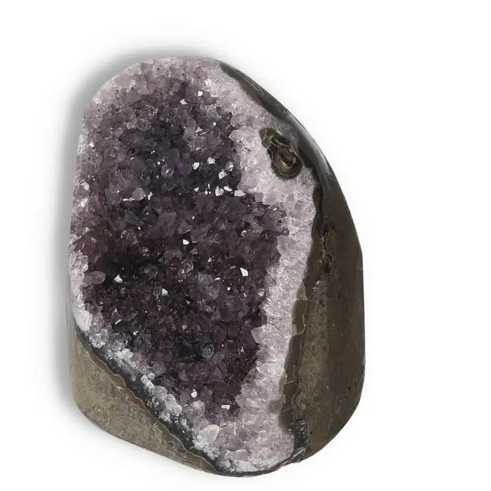 Amethyst cut base geode from Sylvia Crystals, showcasing stunning purple hues and natural elegance.