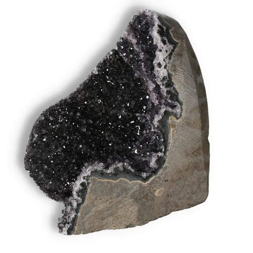 Amethyst cut base geode from Sylvia Crystals, showcasing raw natural beauty and spiritual energy for enhancing mental clarity.