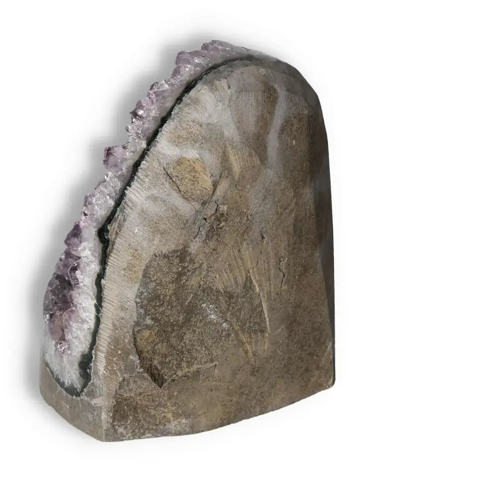 Side view of Amethyst cut base geode from Sylvia Crystals, showcasing its natural beauty and stress-relieving qualities.