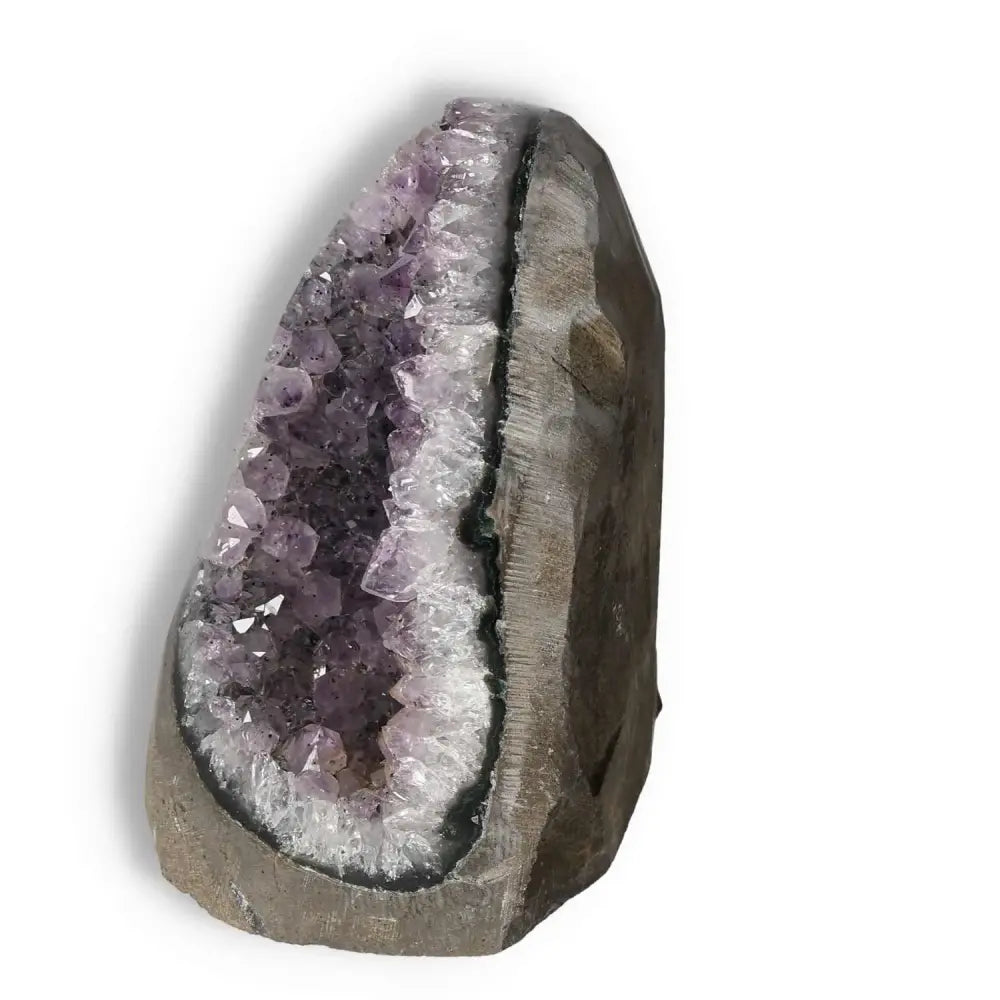 Amethyst cut base geode from Sylvia Crystals, luxury spiritual wellness piece enhancing focus and stress relief.