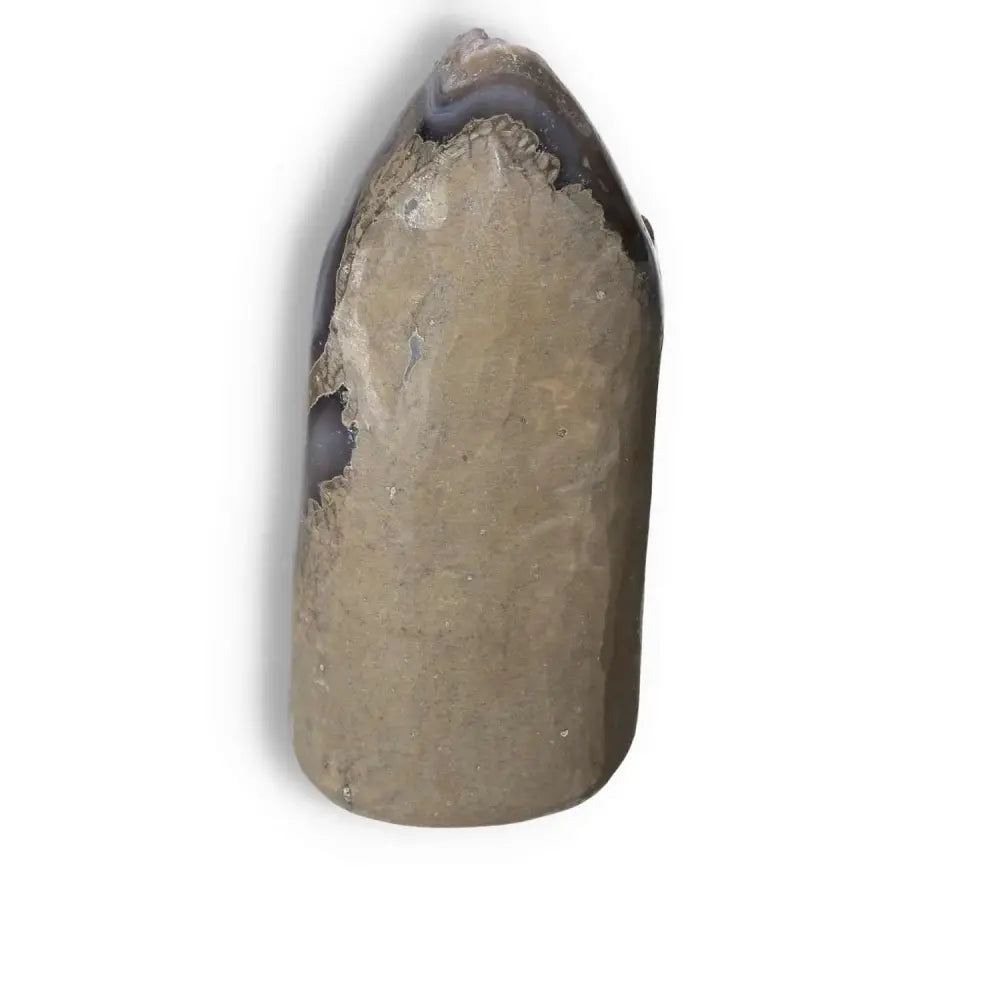 Amethyst cut base geode from Sylvia Crystals, enhancing concentration and emotional stability with natural energy-boosting properties.