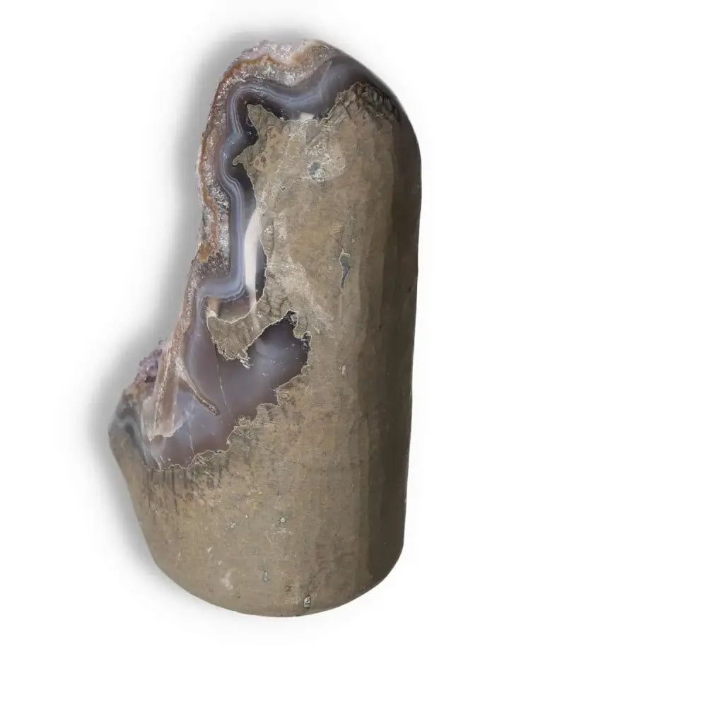 Amethyst cut base geode featuring natural earthy tones and crystal formations, enhancing tranquility and concentration.