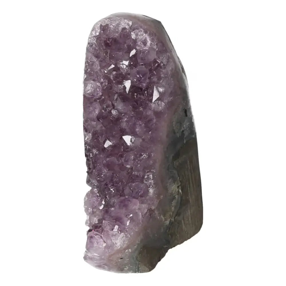 Radiant Amethyst Cut Base Geode from Sylvia Crystals with deep purple tones, promoting calm and emotional well-being.