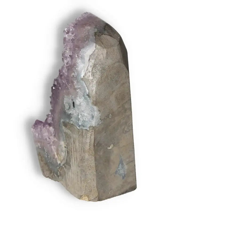 Amethyst cut base geode with rich purple tones from Sylvia Crystals, promoting calm and focus with spiritual and therapeutic benefits.