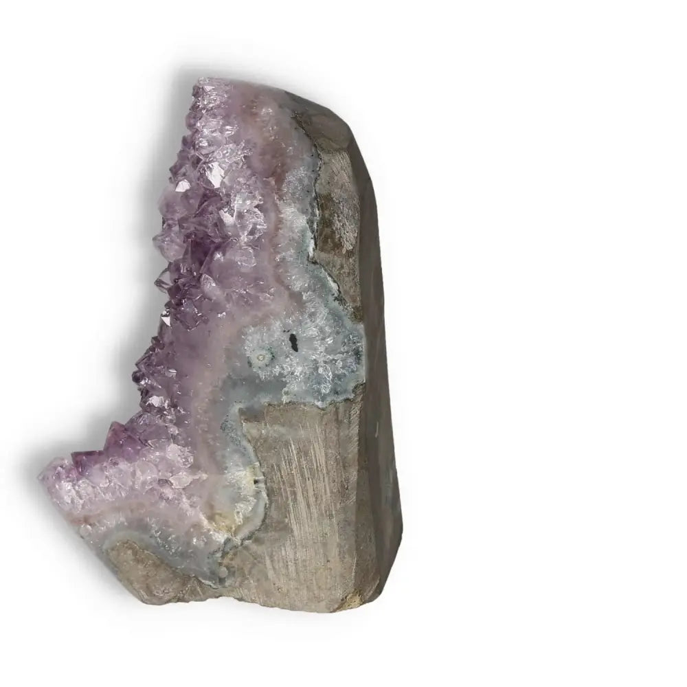 Amethyst cut base geode with vibrant purple crystals, enhancing calm and focus, from Sylvia Crystals.