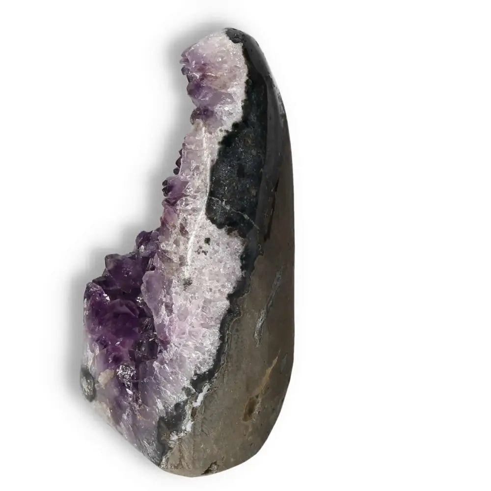 Amethyst cut base geode from Sylvia Crystals, showcasing its natural purple hues and polished sides for spiritual serenity.