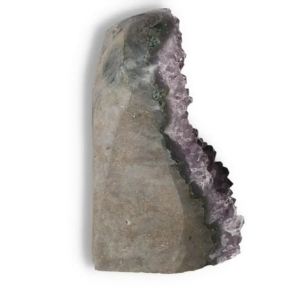 Side view of amethyst cut base geode from Sylvia Crystals, showcasing natural purple crystal formations.