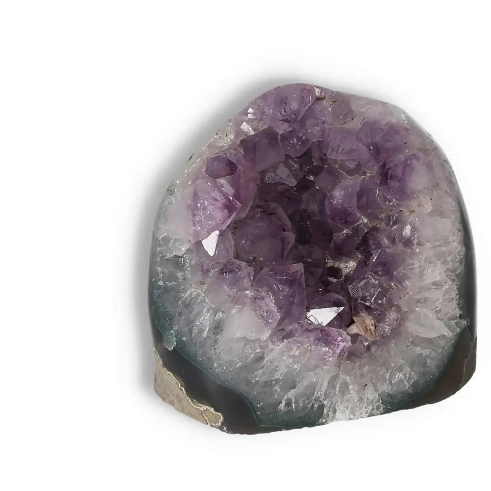Premium Amethyst cut base geode purple crystal, enhancing energy and reducing stress, from Sylvia Crystals collection.
